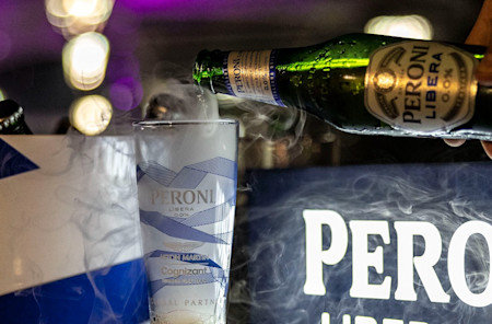 Pouring a glass of Peroni Libera 0.0% to celebrate passion and flair of the weekend
