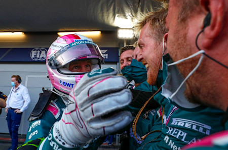 Sebastian embraces his team after sealing the podium finish