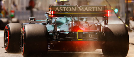Glowing red: Sebastian exits the pits following a pitstop