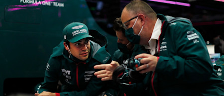 Lance and Performance Director Tom McCullough talk during the delay