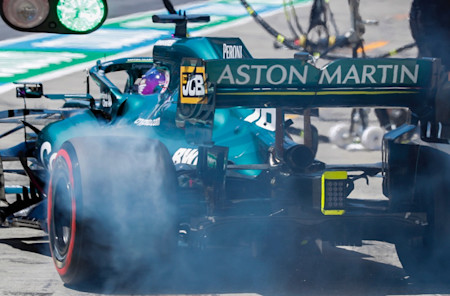 Lance lights up the rears as he pulls away from the pitbox in practice