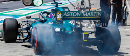 Lance lights up the rears as he pulls away from the pitbox in practice