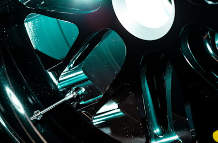 INSIDE OF WHEEL RIM: One of the more recognisable parts on the car. The wheel rim needs to be strong to handle incredible loads and high rpm as the car pounds around the circuit, but also light enough to ensure optimum speed. They are 18 inches in diameter to meet current FIA regulations, but the rim and tyre weigh just 10kg altogether.