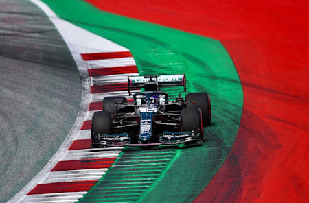 Lance uses all of the kerb at Turn Nine of the Red Bull Ring
