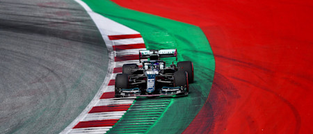 Lance uses all of the kerb at Turn Nine of the Red Bull Ring