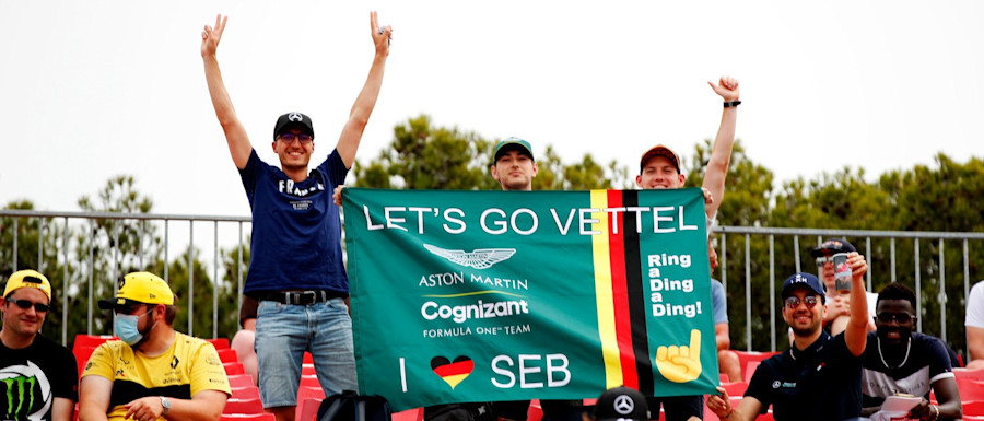 Fans show their support for Sebastian in the grandstands