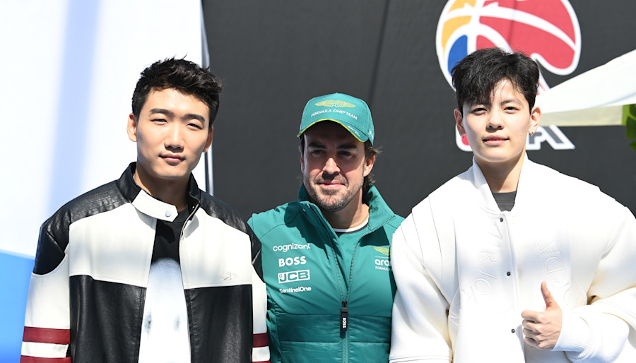 Speed skater Gao Tingyu (left) and basketball star Yang Shuyu (right) joined Fernando Alonso at the basketball competition in the Chinese Grand Prix paddock