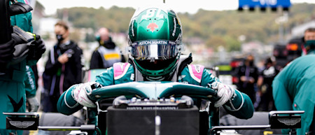 Lance climbs into the AMR21 as the start of the Russian Grand Prix draws closer