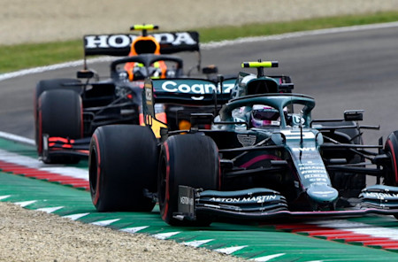 Sebastian holds off Sergio Perez in the Emilia Romagna Grand Prix