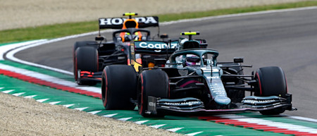 Sebastian holds off Sergio Perez in the Emilia Romagna Grand Prix