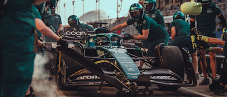 Practice pitstop as dusk falls at the Bahrain International Circuit