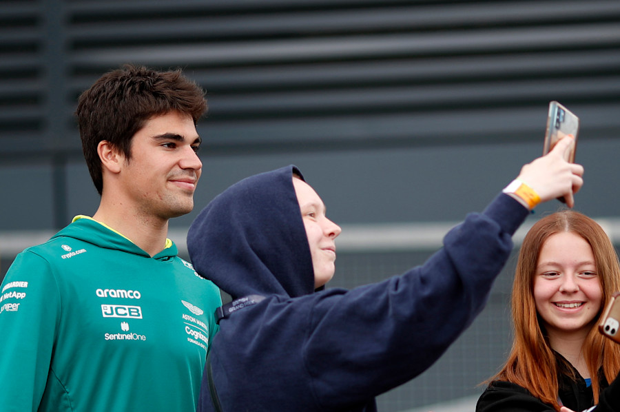 Lance arrives at the track on Thursday and is happy to stop for selfies with fans