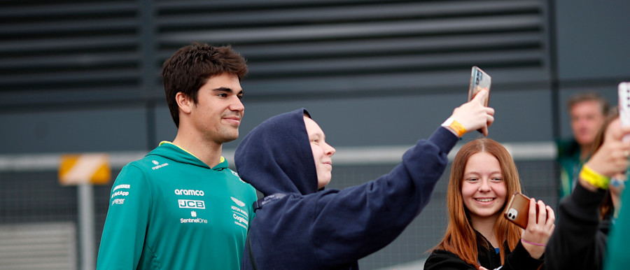 Lance arrives at the track on Thursday and is happy to stop for selfies with fans