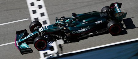 Lance crosses the line and begins a lap in Barcelona