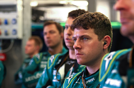 The team in the garage watch on as Sebastian locks up on lap 13