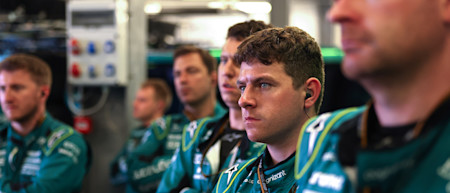 The team in the garage watch on as Sebastian locks up on lap 13