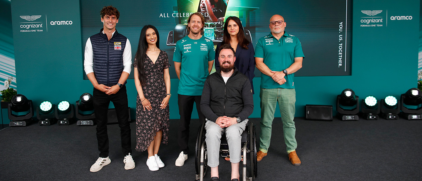 (L-R) Adam Burgess, Jamna Wanza, Sebastian Vettel, Martin Hibbert, Kate Dalton and Matt Bishop.