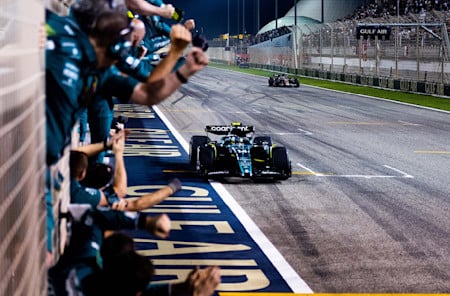 The team effort. Fernando celebrates with the team after crossing the finish line.