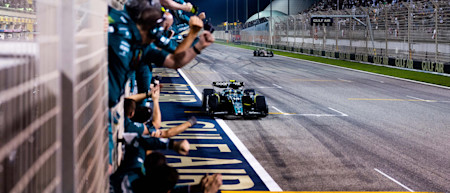 The team effort. Fernando celebrates with the team after crossing the finish line.