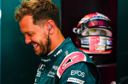 All smiles: Sebastian gets ready to jump in the AMR21