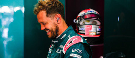 All smiles: Sebastian gets ready to jump in the AMR21