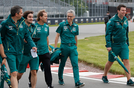 Sebastian, Mike Krack and the team head out on a track walk in the rain