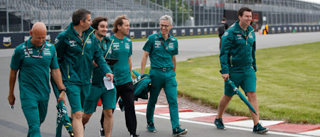 Sebastian, Mike Krack and the team head out on a track walk in the rain