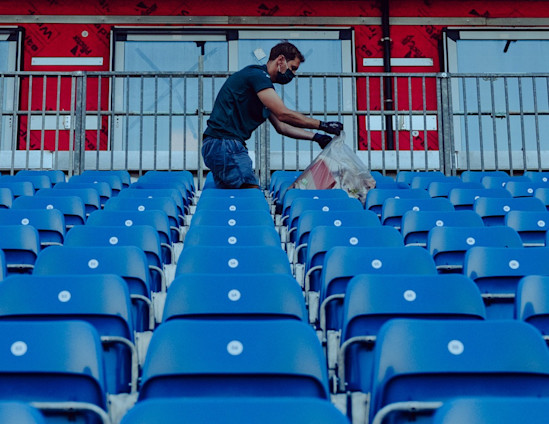 Sebastian picks up litter following the British Grand Prix