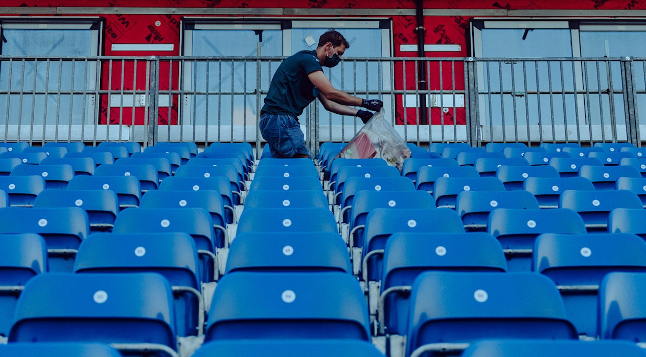 Sebastian picks up litter following the British Grand Prix