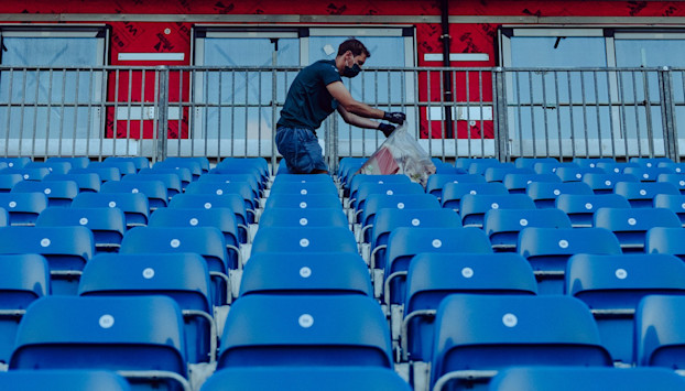 Sebastian picks up litter following the British Grand Prix